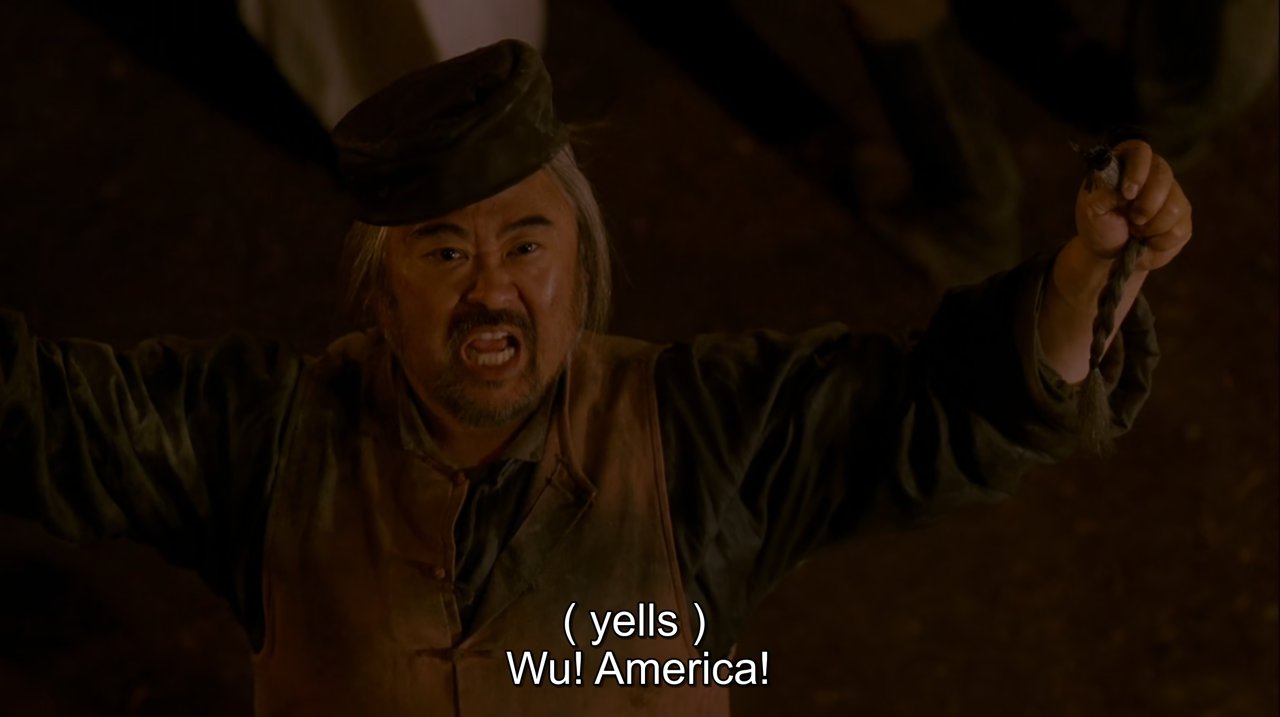 Still from Deadwood: Mr. Wu shouts 'Wu! America!'
